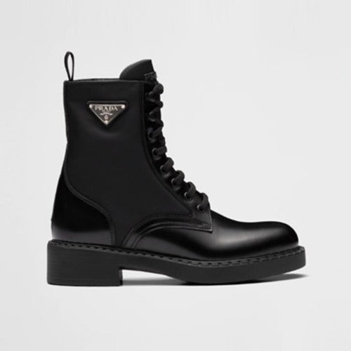 프라다 브러시드 가죽 및 리나일론 부츠 블랙 1T782M